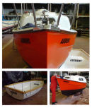 On this selection of boat pictures you can see the vinyl lettering being applied to the boat.